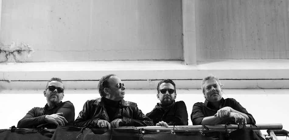 Placeholder for Photo The Blue Mask band balcony black and white